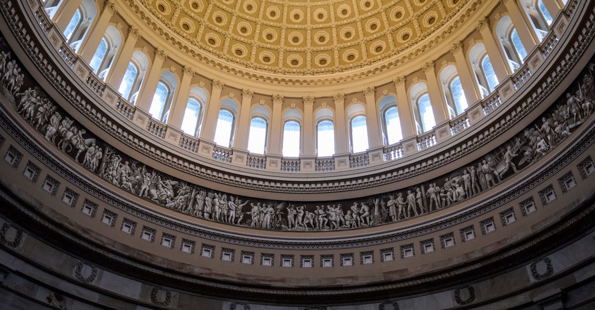 A breathtaking view of the ornate interior dome at the United States Capitol in Washington DC.